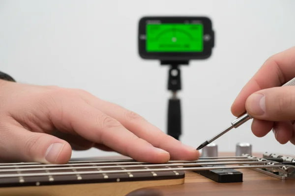 Checking bass intonation at 12th fret